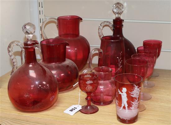 A collection of cranberry and Mary Gregory style glass (11)